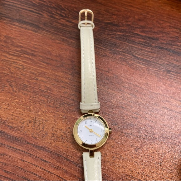 Timex Accessories - Vintage off white small gold face Timex watch stainless steel + genuine leather